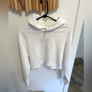 “The Constant” cropped white sweatshirt